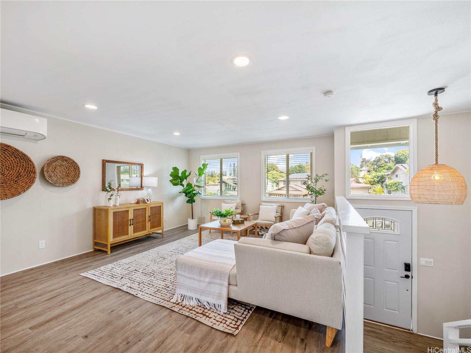 Bright living room with coastal decor and natural light