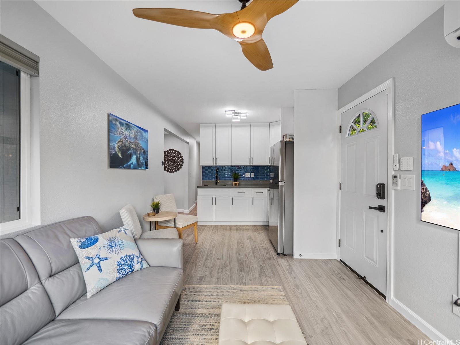 Studio living area with kitchenette and private entry