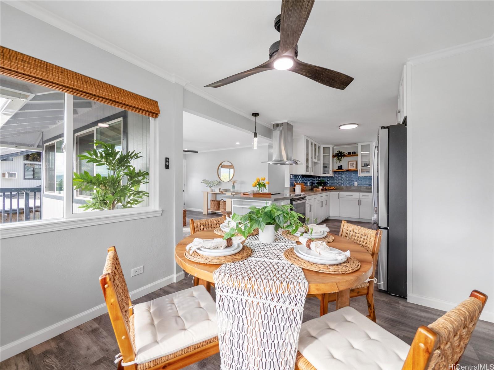 Dining area open to the renovated kitchen
