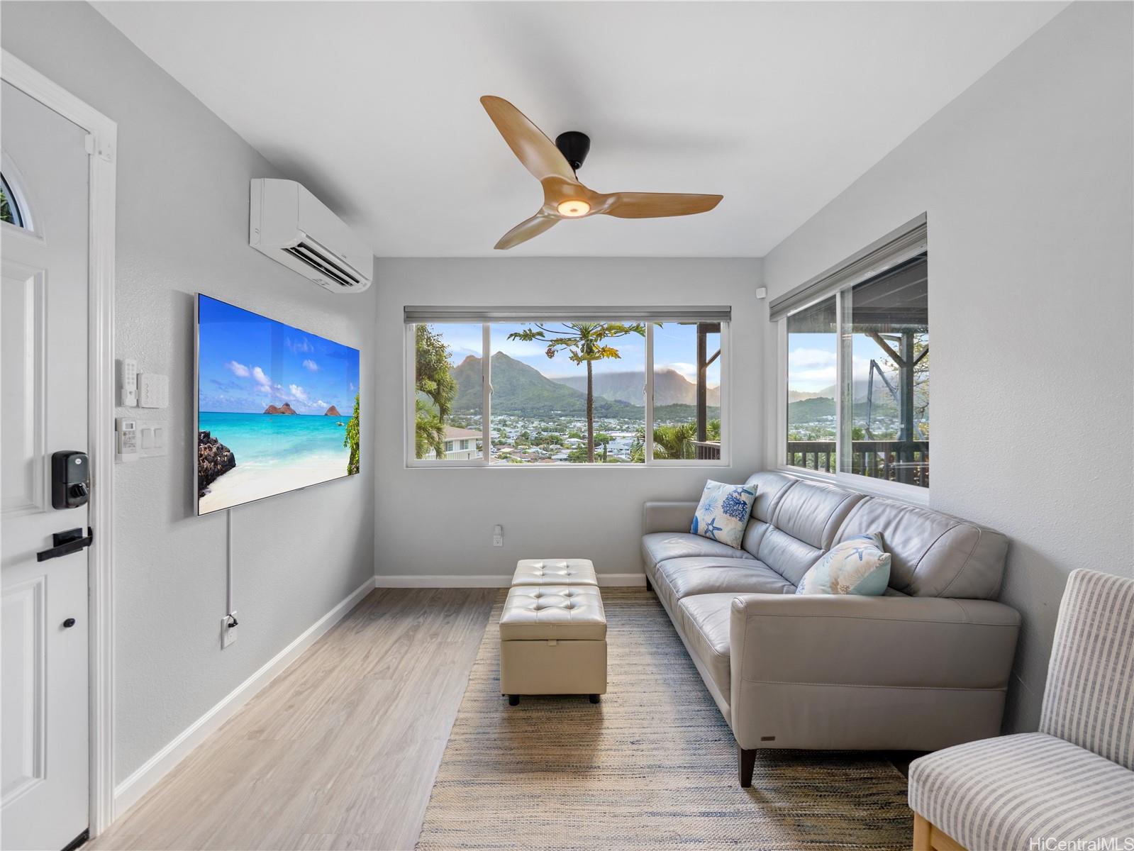 Studio sitting room with mountain and town views