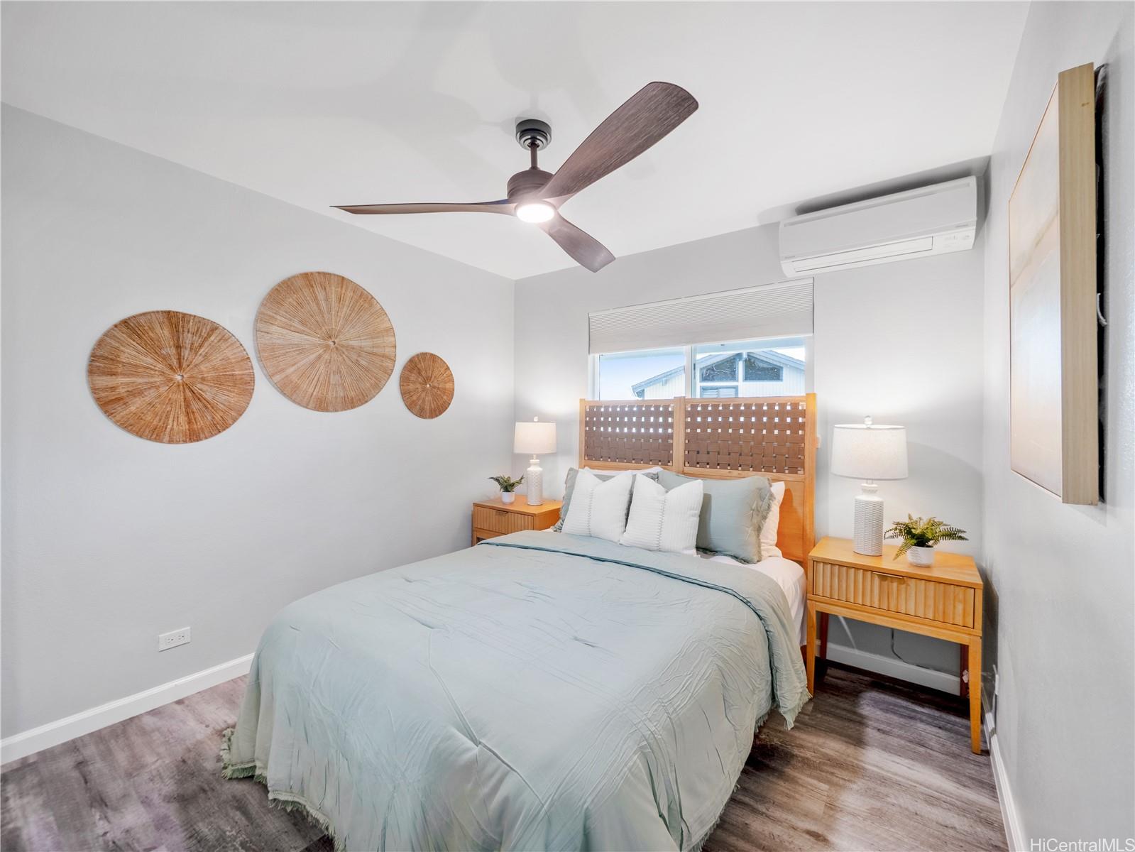 Bedroom with woven decor and split AC