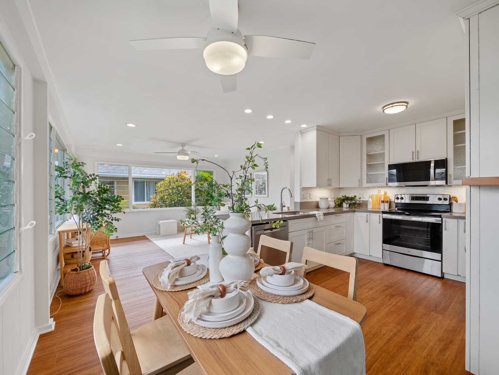 Kitchen and dining with quartz counters and stainless appliances